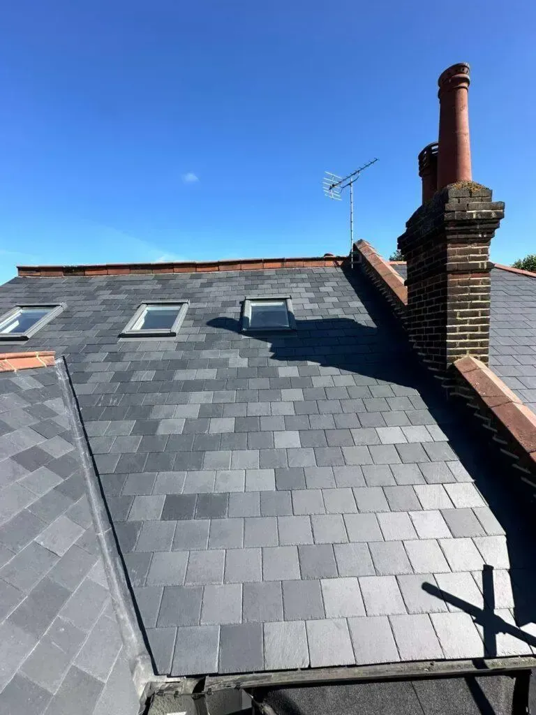 Slate roof and chimney completed by our roofer serving Brentford