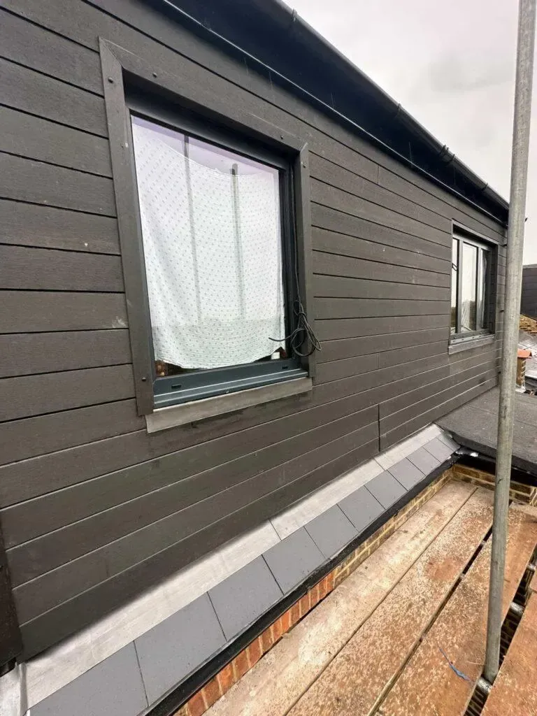 Clad dormer and flat roof finished by our roofing team